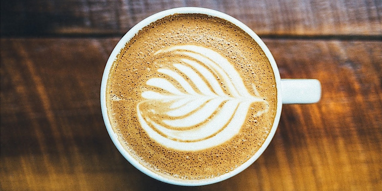Tassimo Gutschein Tasse Kaffee mit kunstvollem Schaum-Arrangement